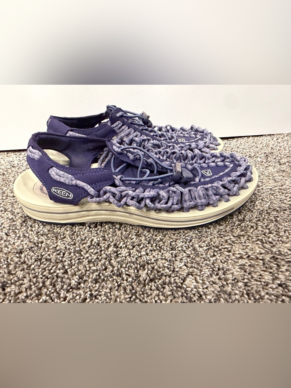 Keen Uneek sandals featuring a unique purple cord sandals size 7.5